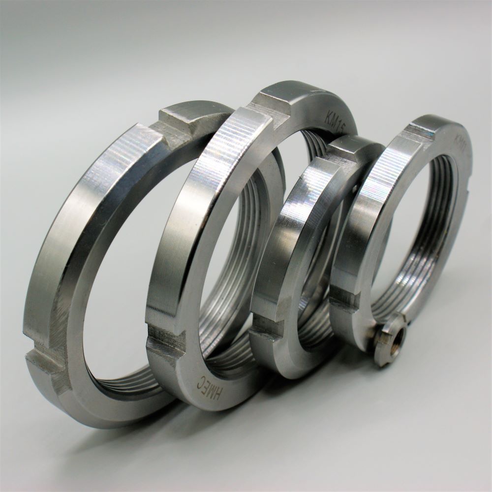 Bearing nut outlet